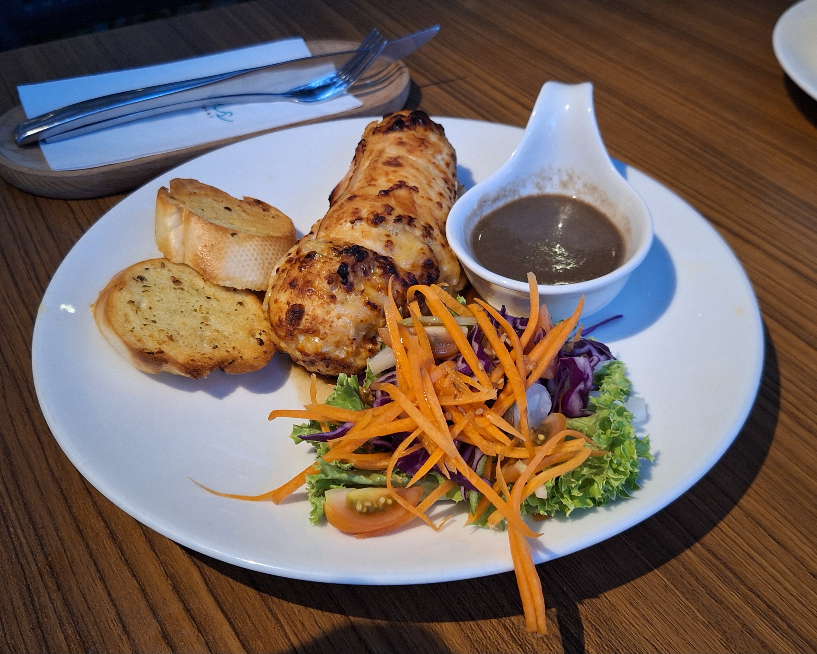 Chicken Caramel Rolled with bread, salad and sauce